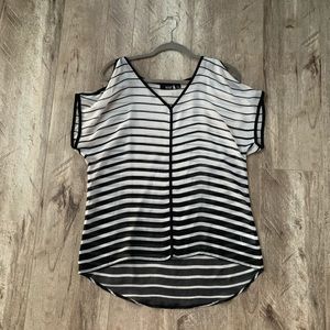 Black and white like new high low top.